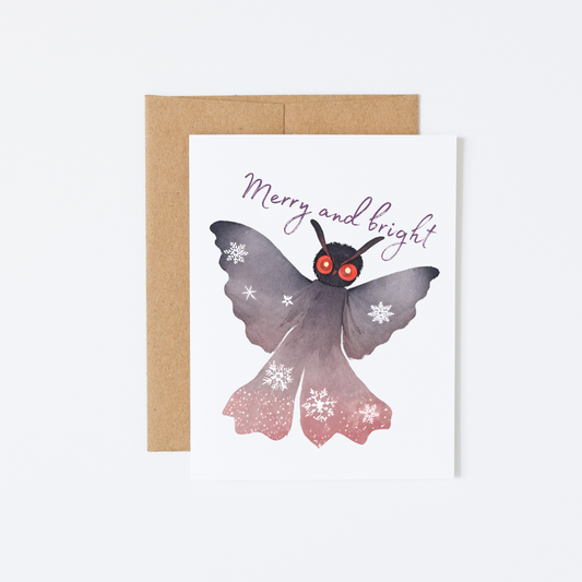 “Merry and bright” Mothman Glowing Red Eyes Christmas Angel Card